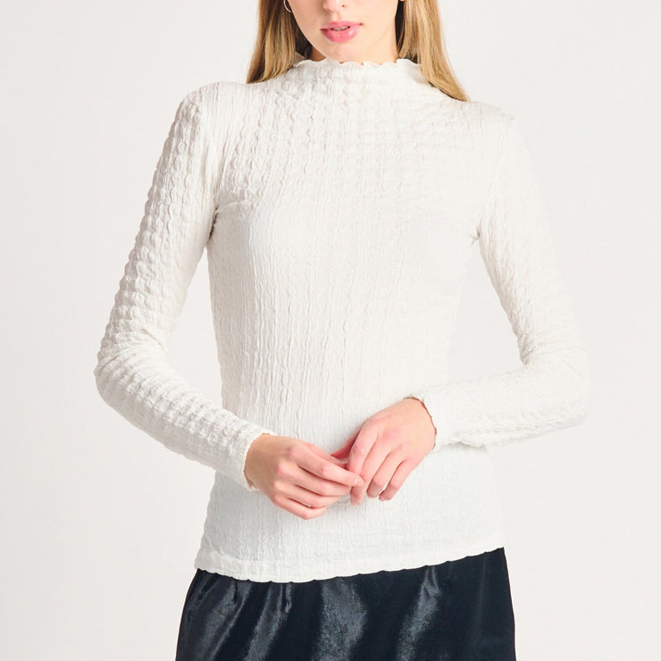 white textured knit top