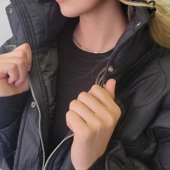 Black quilted coat
